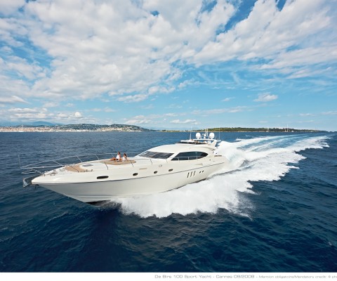 The De Birs 100 Sports Yacht is truly a unique yacht of its kind. The Naval Architecture & Styling was designed by Arrabito Naval Architects out of Livorno, Italy. The interior, designed by H2 Yacht Design out of London, is a rich modern feel that provides luxury and unique multi-functional areas in aft, mini fly bridge and dining areas. The 100 SP has very interesting features with a full beam master suite and the four additional guest rooms. Most interestingly is the bow suit that while it has a split V-berth, it can be put together to become a single double bed. Multi-functional and clever! The overall layout below is very flexible, with double and single beds configuration, and offers the owner 5 cabins that cater to couples, children and VIPs. Unlike most sports yachts, the main level offers a degree of comfort previously unknown in these yachts. Not only does the DeBirs 100 SP provide an open floor plan with bar, entertainment and unique foldable dining and tapas table, but it also separates the crew from the main salon.
