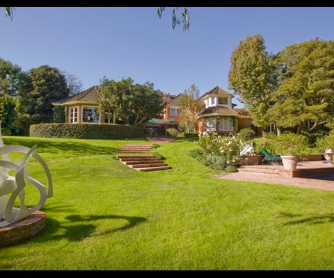 Gated and Private, this Majestic Traditional is located on one of the most sought after streets in all of Los Angeles, Delfern Drive, and is sited on almost three acres of rolling lawns and lush gardens.  This exquisite classic estate offers sumptuous living in this rare location. 