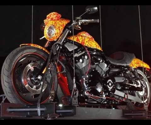On October 21, 2010, artist Jack Armstrong’s million-dollar Cosmic Starship Harley Davidson was unveiled at Bartels Harley-Davidson in Marina Del Rey, California. At $1,000,000, this is the world’s first and only million-dollar Harley