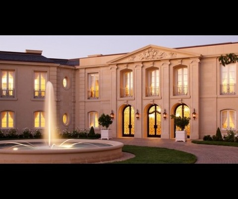 The home is the Loire Chateau and is located in Silicon Valley, in Palo Alto. The size is a 25,000 square foot residence that was built on 18 acres of land. It is surrounded by panaramic Bay views. According to architect William Hablinski, the home got it�s inspiration from and 18th century French chateau, which is what it was made to look like. The home includes a towering front fa�ade along with a central entry courtyard with three formal entrances. The home had two wings, in one there is a formal dining room, grand ballroom, theater, wine cellar, spa and gym. In the other you have family rooms, bedroom suites and living areas.