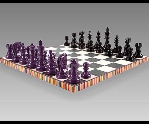 From iconic British designer Paul Smith comes this beautifully hand constructed chess set. Featuring some of his signature stripe patterns along the board's edge, the bottom is lined with the finest purple suede. 