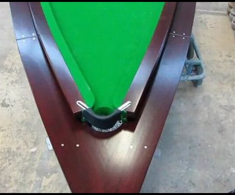 Peter McKee has created a $60, 000 pool table out of a speedboat.