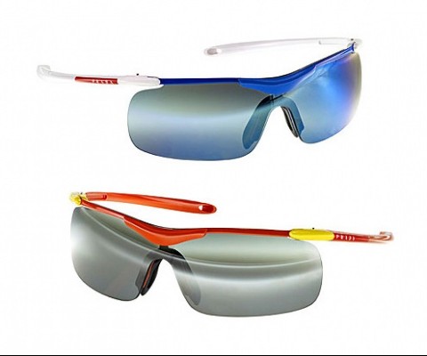 Prada gives us a sneak peak at their spring / summer 2011 sunglasses collection and it looks promising. Sportiness seem to be the theme for next year and Prada embraces a retro, 80′s flair, wrap-around style available in four different colors.