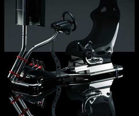 The VisionRacer VR3 is a gaming rig that consists of a fiberglass racing seat surrounded by a stainless steel frame. Each VisionRacer rig is designed by motor sport professionals for use as pure exhilarating fun or a serious training too
